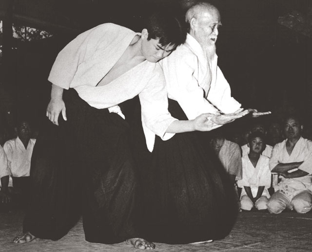 Morihei Ueshiba performing tai-no-henko